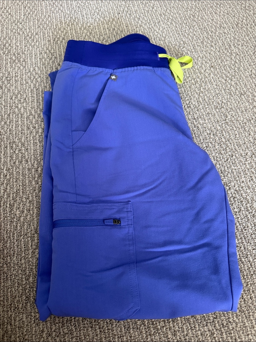 Figs Women’s scrub pants. Electric Blue Drawstring Joggers with Neon Accent